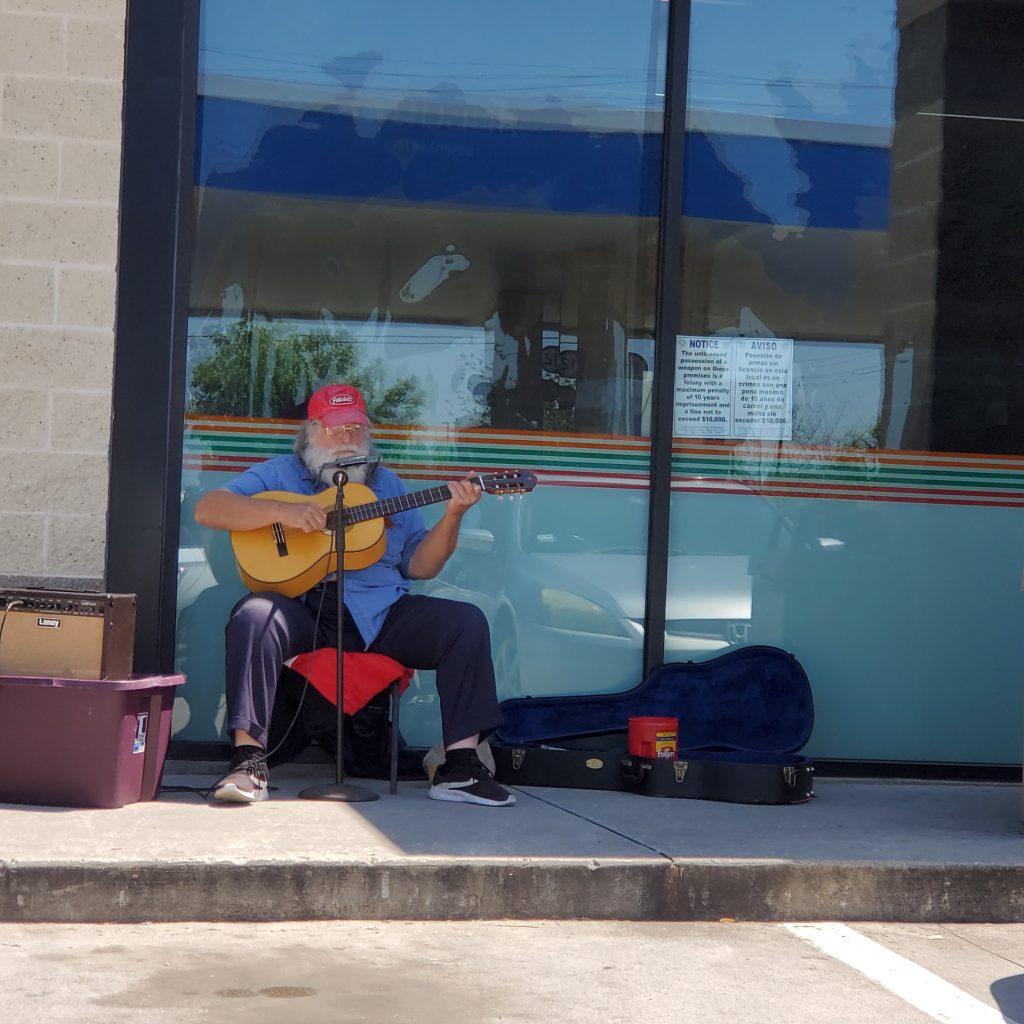 This man sits outside and sings of 7-11 on Hebron and Josey at least 4 days a week. 
