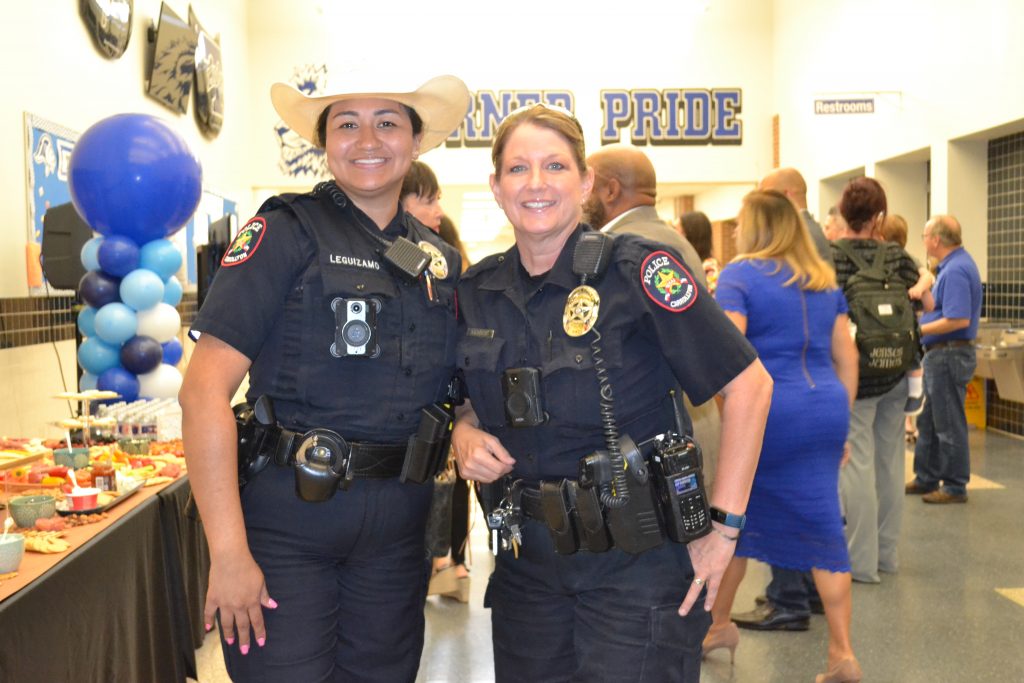 Two of our OUTSTANDIN Carrollton Police Officers at a function at RL Turner HS